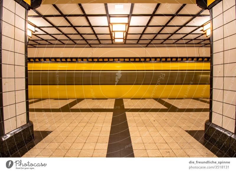 There's a train to nowhere Subway Berlin bvg Train station Town Architecture Capital city Station Long exposure Yellow Symmetry Manmade structures Deserted