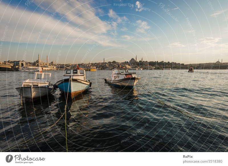 Fishing boats on the golden horn. Istanbul galata Mosque Town Transport traffic Manmade structures Fisherman River river Construction Moody statics Strength