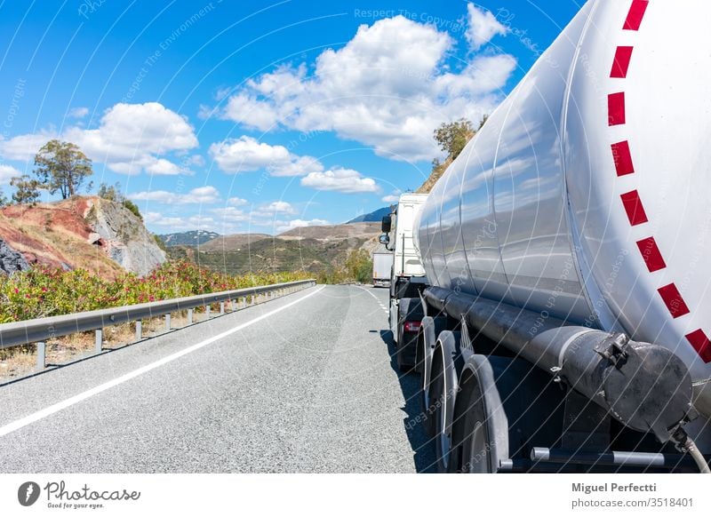 Tanker truck tanker truck dangerous goods fuel liquid transport petroleum oil industry road storage tank diesel supply load ADR trucking on the road semi