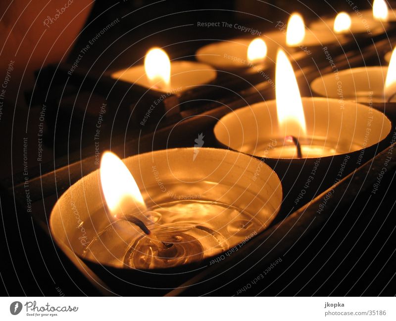 Teelights Decoration Candle Dark Warmth Yellow Black Emotions Moody Romance Tea warmer candle Candlelight Candle flame Burn Warm light Colour photo Detail