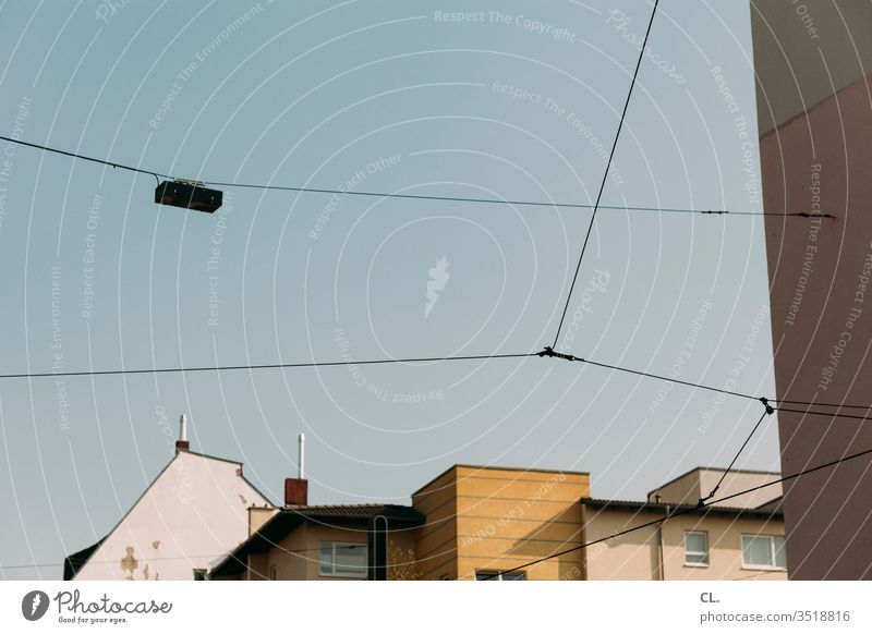 skies and houses Sky Blue sky Architecture Wall (building) Cable built clear House (Residential Structure) Abstract street lamp