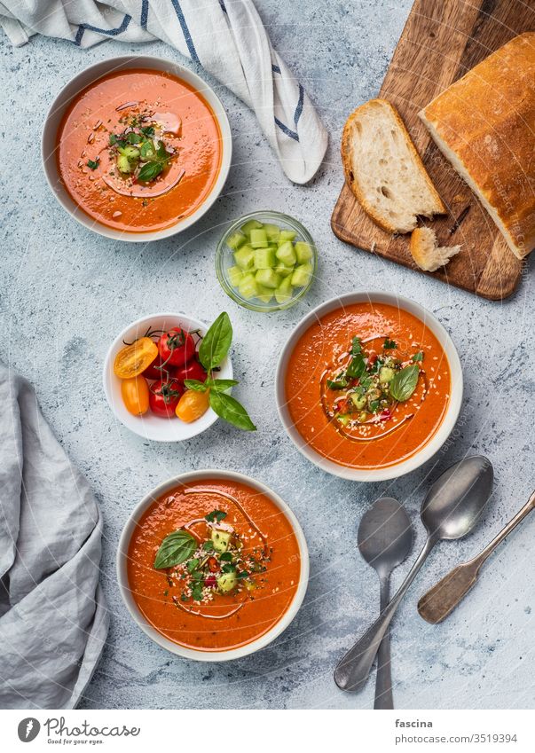 Gaspacho soup on light marble, top view gaspacho tomato gazpacho capsicum bowl cold food red summer vegetable spanish vegan basil meal vegetarian background