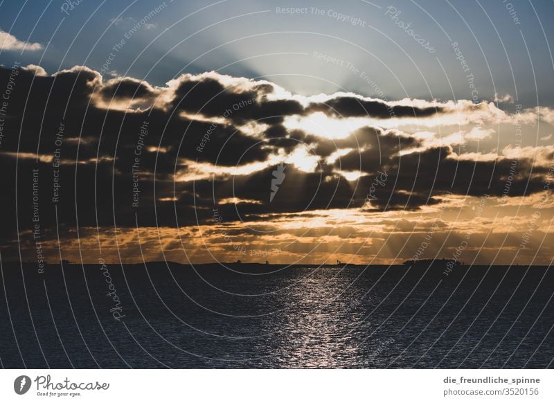 Sunset at the promenade Warnemünde Baltic Sea Sky Clouds Water Lake Ocean Long exposure Colour photo Rostock Exterior shot Mecklenburg-Western Pomerania Nature