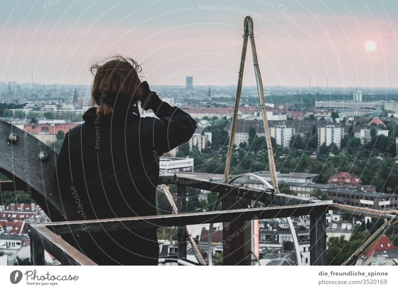 With a view over Berlin outlook Gasometer Sunset Twilight person Sky Exterior shot Capital city Panorama (View) Skyline Downtown Tourist Attraction Landmark