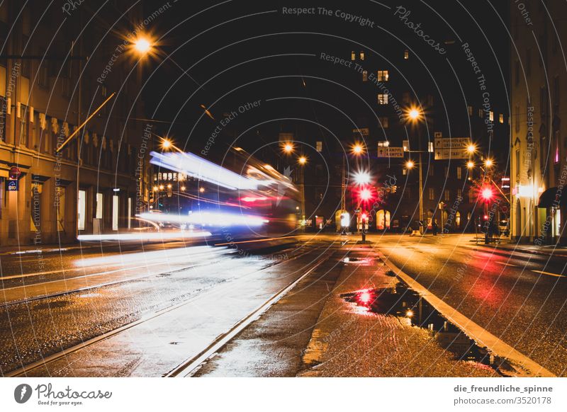 Tram at night Rain Night Long exposure Lantern Town urban Glare effect Light Street conceit Transport Movement light puller Speed Lighting Mobility