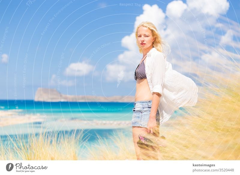 Free Happy Woman Enjoying Sun on Vacations. woman nature free happy summer wind freedom beach young girl beautiful beauty happiness outdoor white sunshine