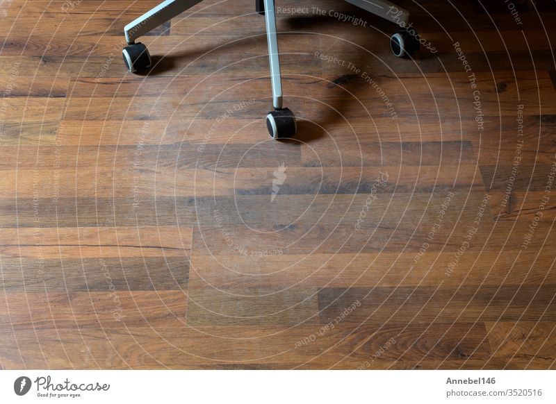 Damaged Laminate Floor from office chair wheels in a home needs