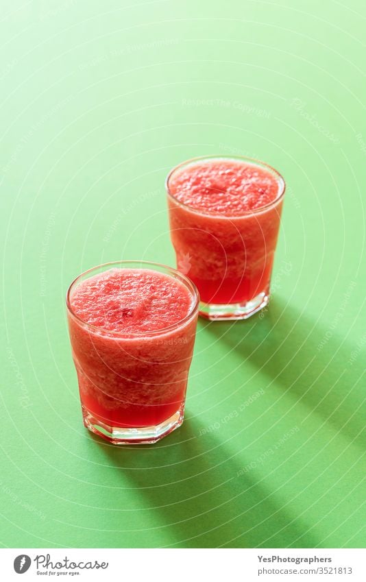 Glass of watermelon drink. Two portions of slush. Cold beverage breakfast cold drink colorful delicious dessert detox diet fresh freshness frosty frozen