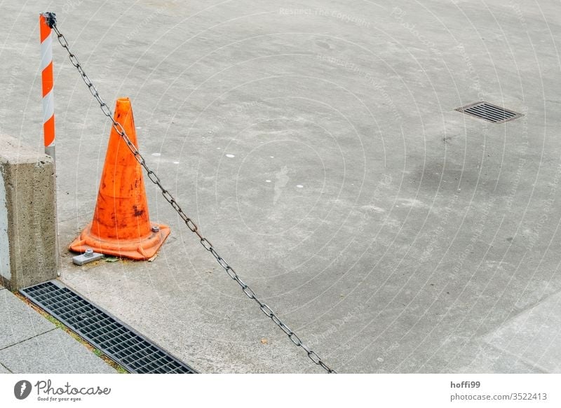 closed entrance with chain and warning cone guiding cone Chain cordon Highway ramp (entrance) No entry keep the driveway clear Warning sign Warning label