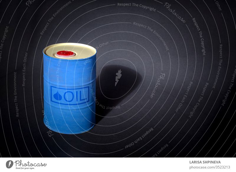 Metal barrel of oil with text "oil" on black background. Concept of oil market production, global financial crisis. gasoline industry metal pollution isolated