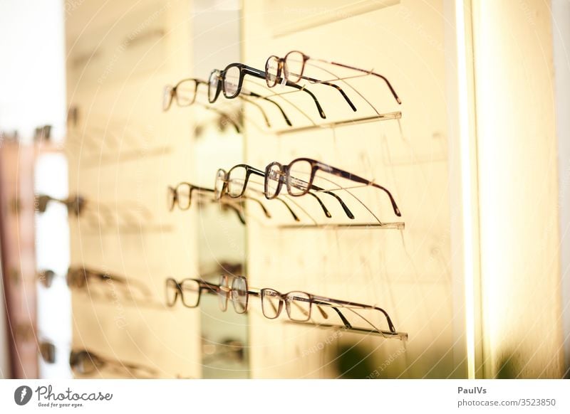 Eyewear at optician / selection of eyewear / optician's shop Optician Optics Spectacles Fashion see Eyes visually impaired focus Healthy sale shank Pupil Senses