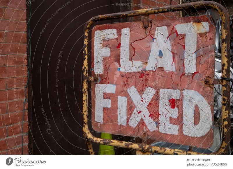 Distressed old fix a flat tire red and white sign old weathered flat fixed sign distressed old design illustration typography poster banner symbol card