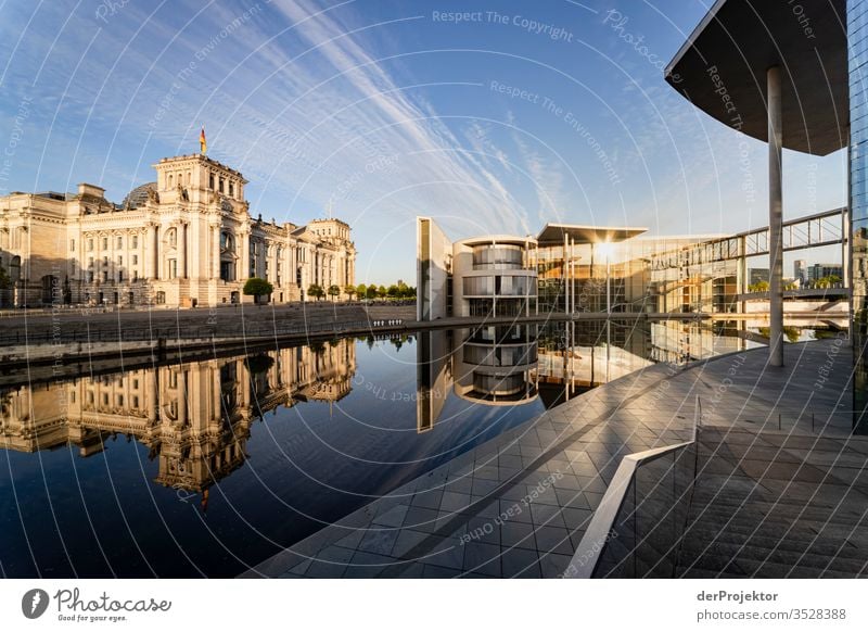 Government quarter in reflection in Berlin Central perspective Mirror image Multicoloured Exterior shot Dawn Long shot Sunlight Light Copy Space right