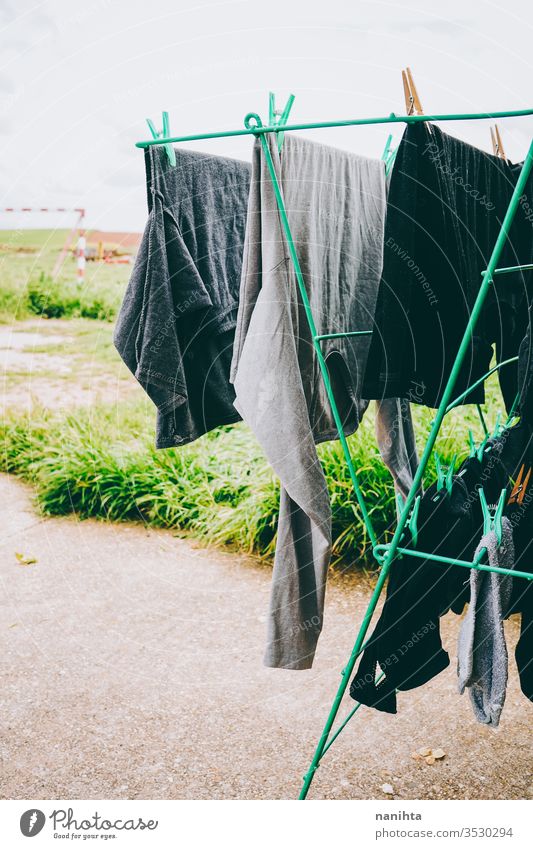 Washing Line With Drying Clothes In Outdoor. Clothes Hanging On