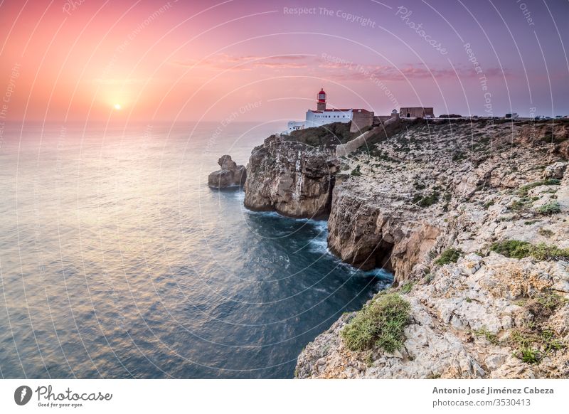 View of the lighthouse and cliffs at Cape St. Vincent at sunset. Continental Europe's most South-western point, Sagres, Algarve, Portugal. algarve architecture