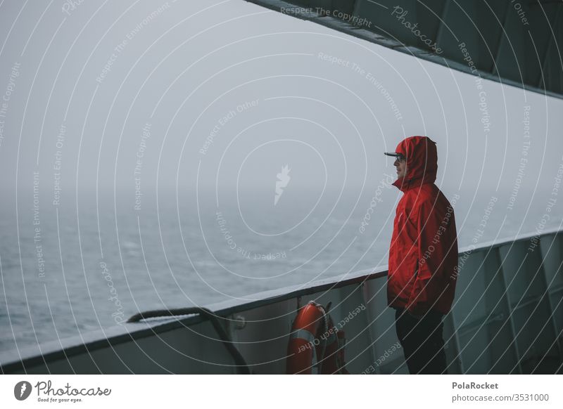 #AS# crossing Red Jacket Ferry Crossing Life belt Navigation ferry trip Disperse Ocean seascape hazy Fog Boating trip rehling Observe Man Young man Eyeglasses