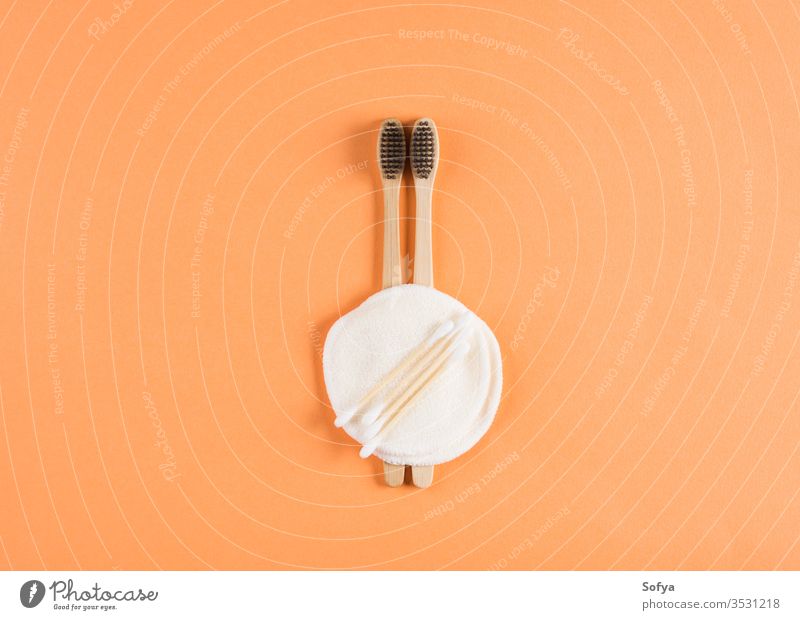 Zero waste beauty concept with toothbrushes zero waste background lifestyle bamboo natural nature orange organic products recycle hygiene set summer wellness