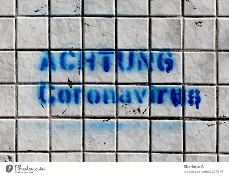 corona thoughts | attention Coronavirus! Blue writing on white tiles. coronavirus corona crisis coronavirus SARS-CoV-2 Graffiti Characters leap White Trashy