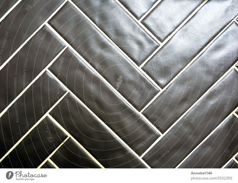 Shiny glossy black mosaic seamless background. Abstract geometric