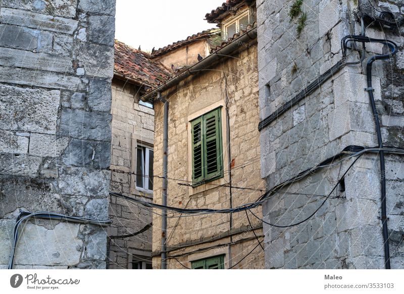 Stone buildings in the old district of Split in Croatia city croatia split stone town architecture view ancient house street urban historic summer wall window
