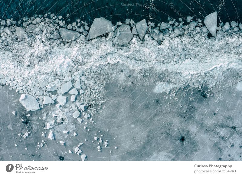 Glacier Lagoon with icebergs from above. Aerial View. Cracked Ice from  drone view. Background texture concept. - a Royalty Free Stock Photo from  Photocase