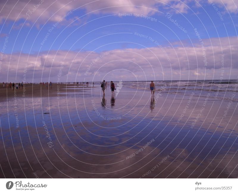 Humid horizon including groupies Damp Sand Water Ocean Tourist Swimming & Bathing Lake Clouds Sky Horizon Blue White Human being Loneliness Empty Far-off places