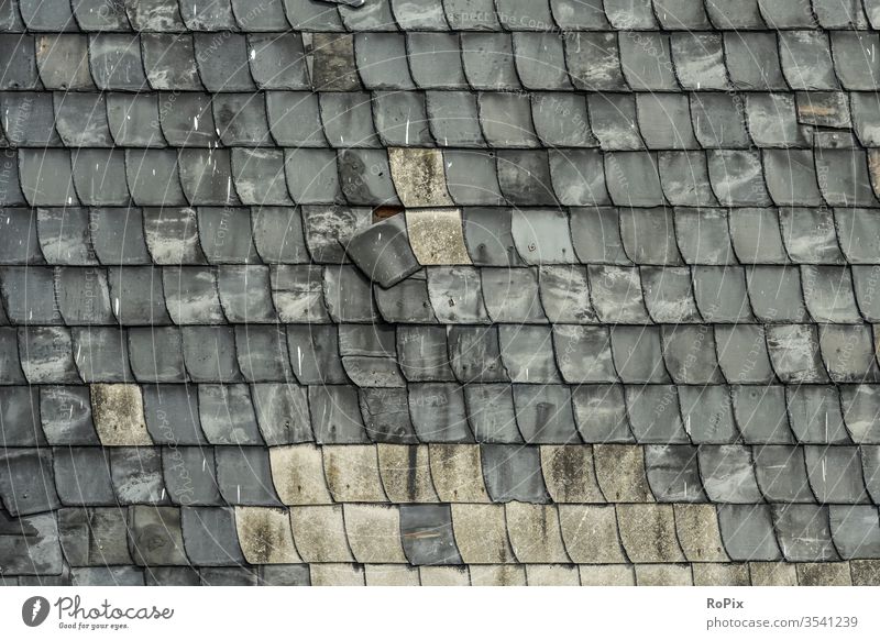 Slate shingles on an old façade. masonry slate reinforcement Stone Natural stone Stone wall Wall (building) rampart Manmade structures Architecture texture