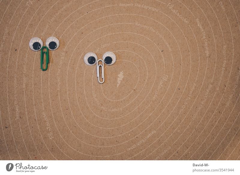 two paper clips look into the camera - big eyes / faces Face peep Observe wittily creatively saucer-eyed inquisitorial Infancy Cute Creativity Figures creatures