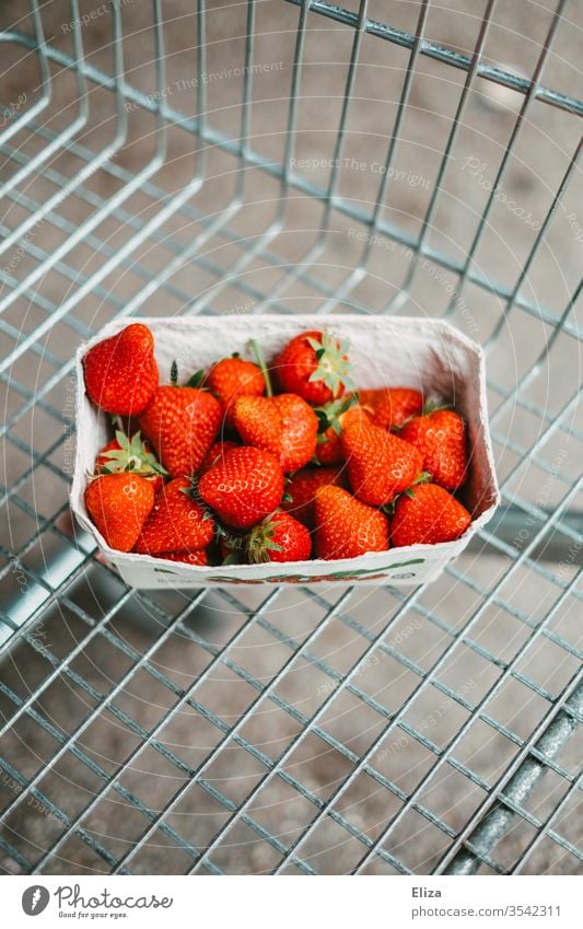 A bowl of fresh strawberries in a shopping trolley Strawberry shell Fresh Shopping Trolley Supermarket Food fruit fruits Mature Healthy Eating Delicious Red