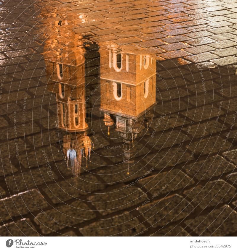 The reflection of the St. Mary's Basilica in Krakow architecture basilica building cathedral catholic church city cityscape cobblestone Cracow culture europe