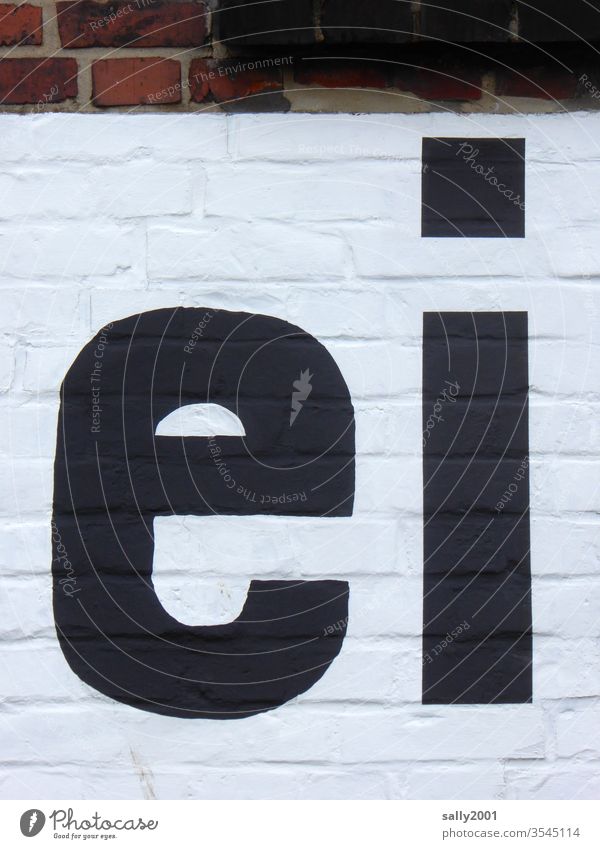 a... Egg Letters (alphabet) writing Inscription Wall (building) Facade black-white black on white Brick wall great lowercase pamphlet Wall (barrier) Characters