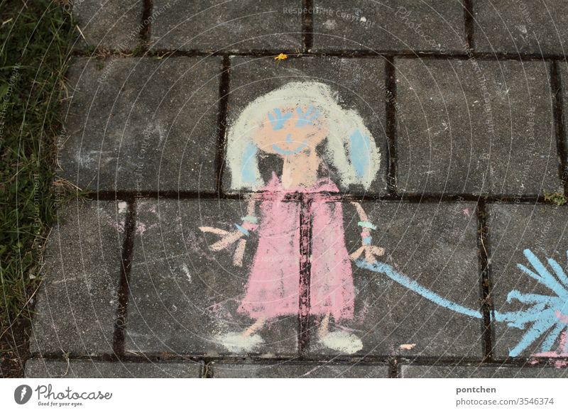 Children S Drawing Children S Art From Street Chalk A Painted Girl Holding Something In Her Hand Child S Play A Royalty Free Stock Photo From Photocase