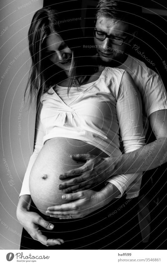 the parents are looking forward to the offspring pregnancy Black & white photo pregnancy shooting Parents become parents Pregnant Joy maternity Baby Stomach