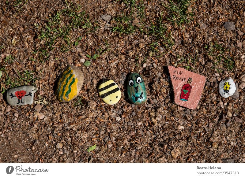 Painted wish stones in Corona times as a sign of cohesion coronavirus painted wishing stones children's painting Sign Attachment variegated Row symbol
