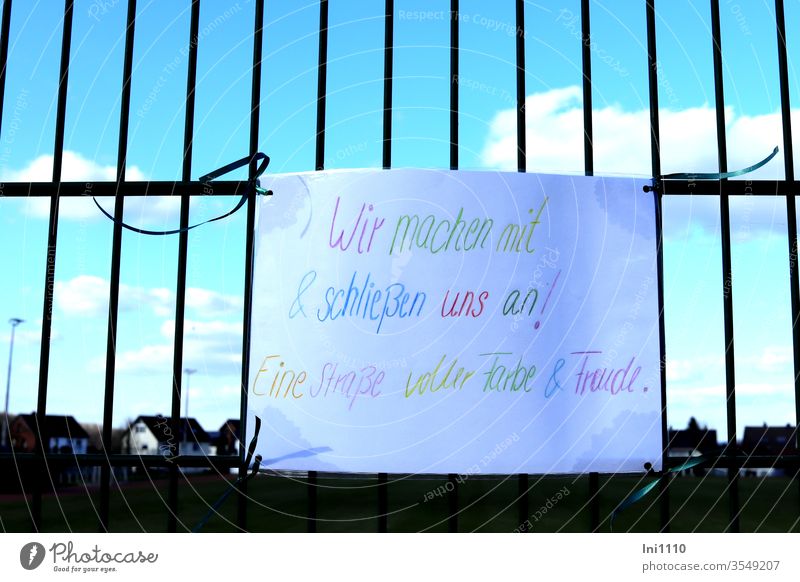 handwritten poster with colorful writing as a sign of solidarity during Corona corona virus Solidarity Compassion Loneliness Attachment stick together