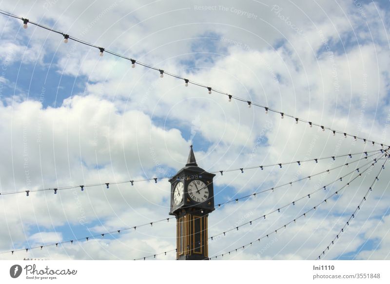 historical clock at the entrance to the pier of Brighton in the foreground Historic Buildings England East Sussex Brighton Pier Clock Tower Tourist Attraction