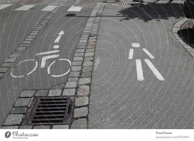 A bicycle path with pedestrian walkway Cycle path, traffic, road, environment, city, urban Transport Street Traffic infrastructure Signs and labeling