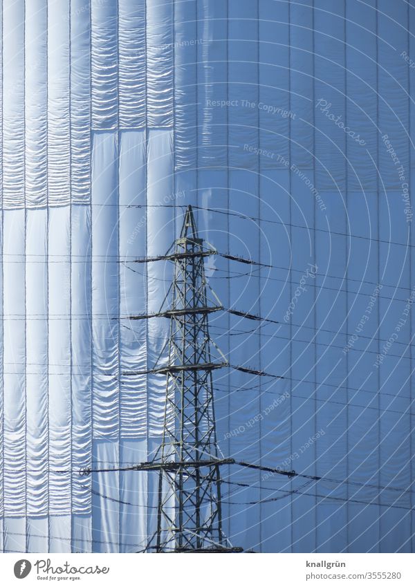 Close-up of the veiled gasometer in Oberhausen, in front of it an overhead line mast Gasometer Industry shrouded Exterior shot Manmade structures Industrial