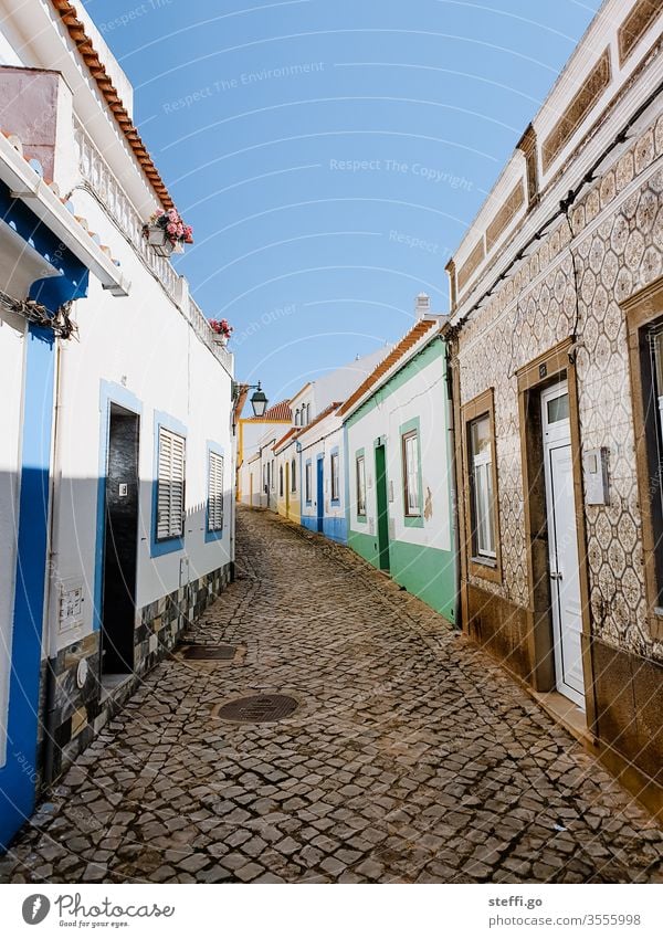 small alley with colourful houses without people in Ferragudo, Portugal Europe Alley Old town Vacation & Travel House (Residential Structure) Architecture