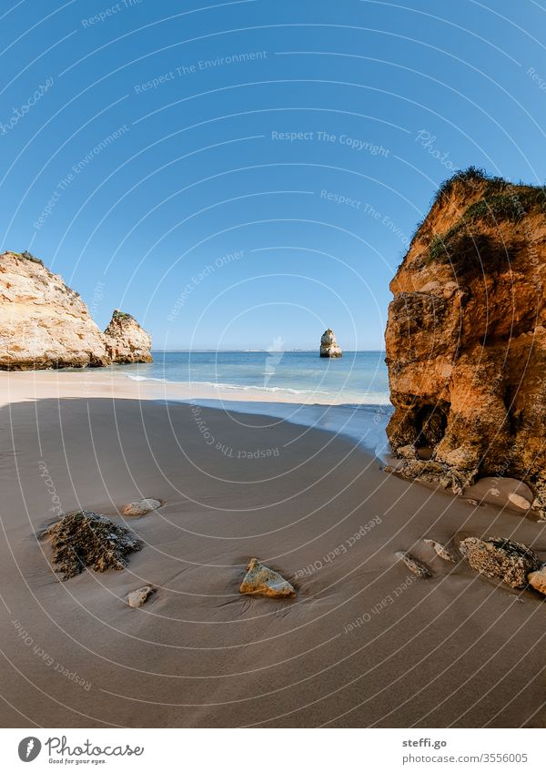 Bay in the Algarve with sandy beach and rocks in good weather Portugal Summer vacation Sandy beach Beach Ocean Rock rock salt sandalgarve Vacation & Travel