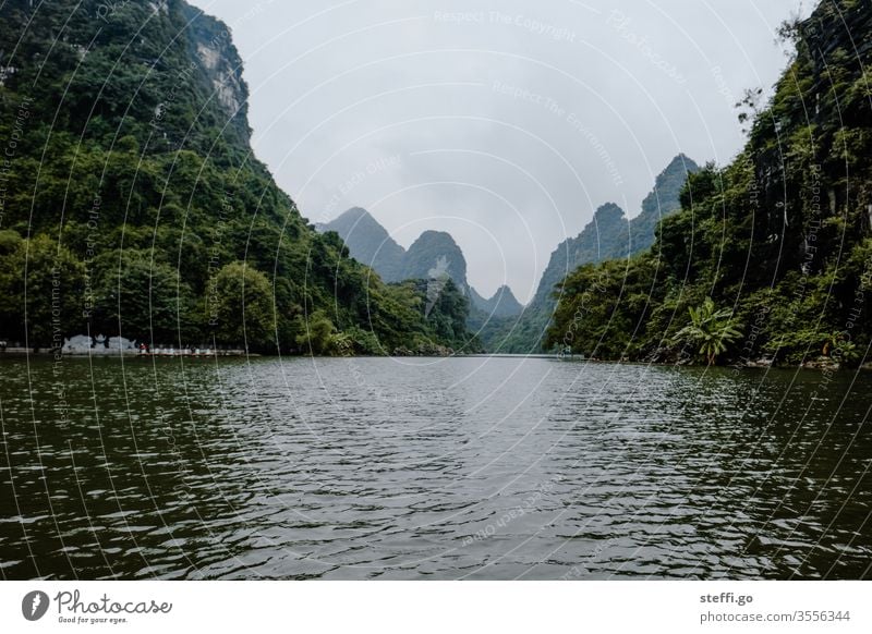 Water landscape between mountains and rocks in Ninh Binh, Vietnam karst karst landscape karst mountains dry halon bay Dry Halong Bay Rock Mountain Halong bay