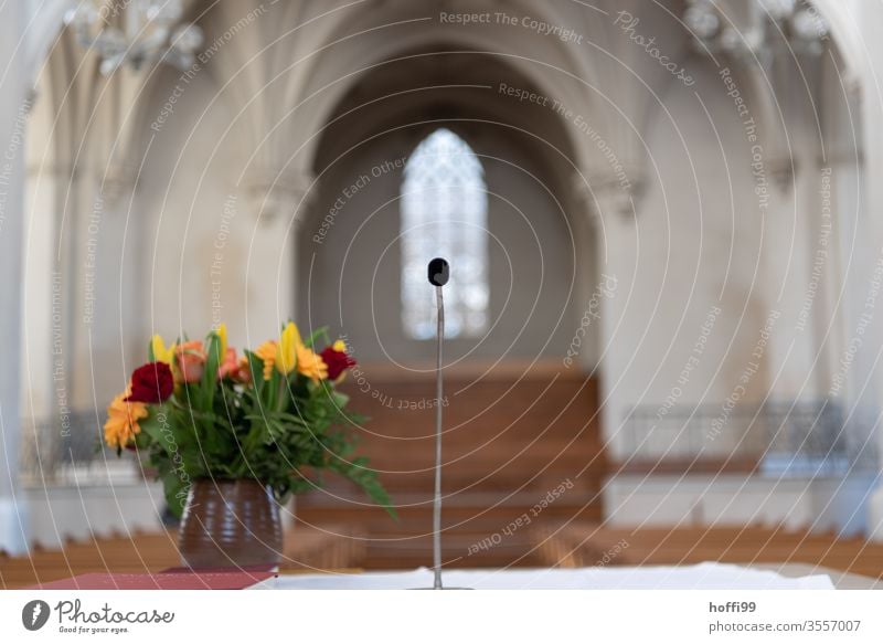 Altar with flowers and microphone in front of empty church Church Microphone Bouquet Sanctuary Deserted Blank space lockdown Corona virus Protection