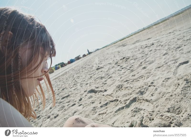 teenager sitting on a beach at low tide with a sloping horizon Youth (Young adults) Profile Face hair Sit Summer Sun Beach Sand Ocean North Sea Low tide Tide