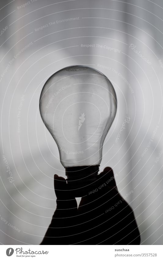 Female Hand Holding An Old Light Bulb A Royalty Free Stock Photo From Photocase