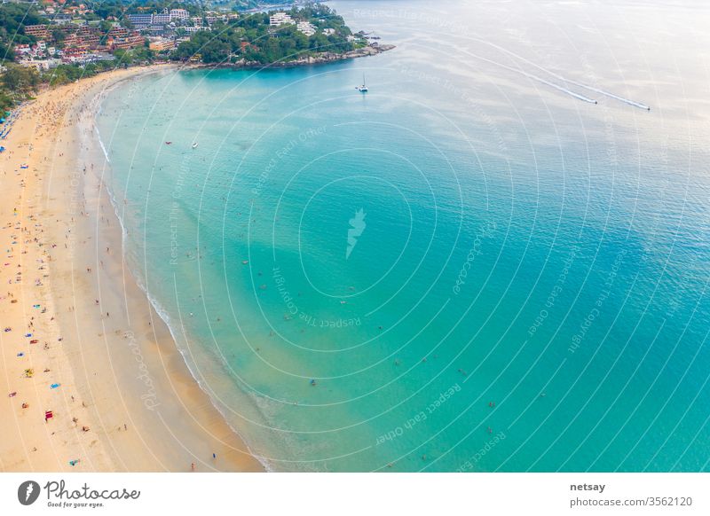 Kata  beach, Paradise beach with golden sand, crystal water and palm trees, Patong area on Phuket Island, Tropical travel destination, Thailand. Aerial Green