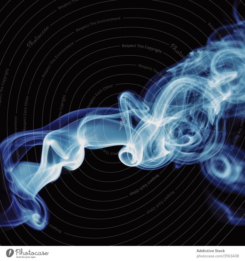 Abstract backdrop with stains of blue incense smoke colorful swirl abstract whiff steam background aroma scent vortex fragrant shape fume curve diffuse fog
