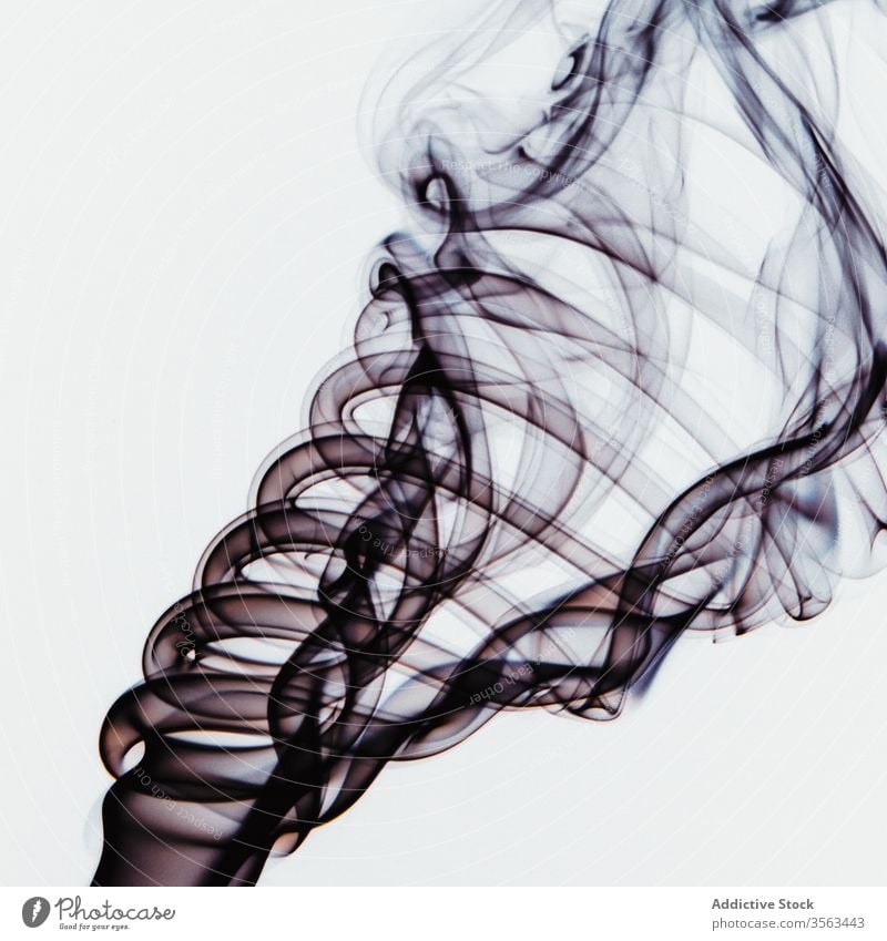Abstract backdrop with stains of black incense smoke colorful swirl abstract whiff steam background aroma scent vortex fragrant shape fume curve diffuse fog