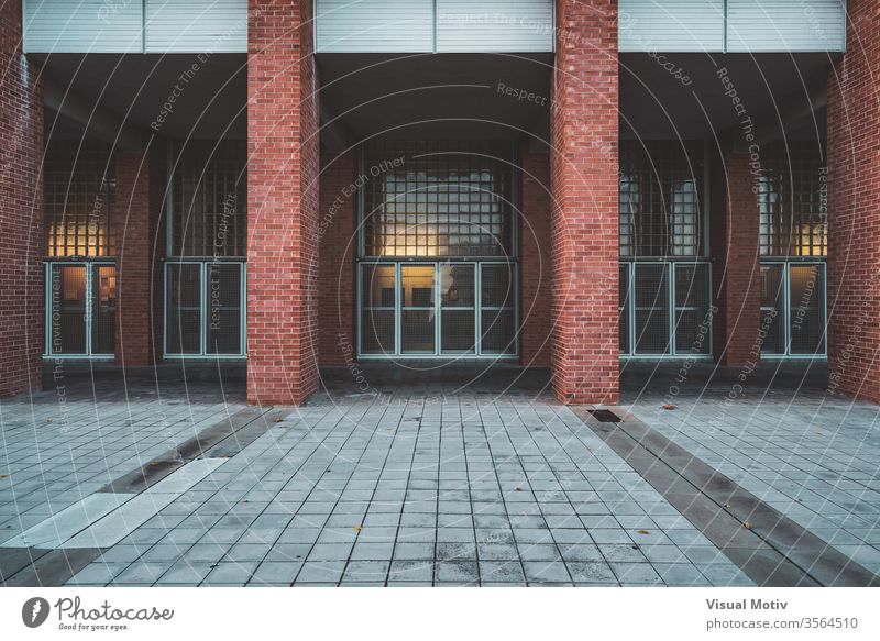 Brick columns and facade of an university building in the afternoon architecture entrance brick modern glass structure construction wall urban town door