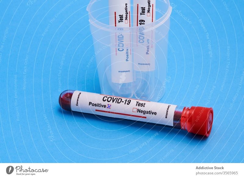 Set of positive marked COVID 19 blood sample test tubes coronavirus covid19 diagnostic medicine health care research analysis container measure examine study