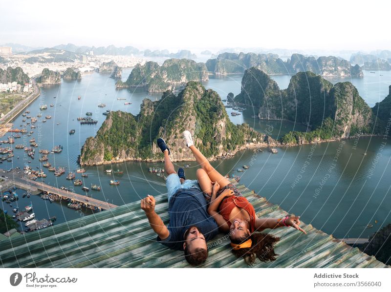 Traveling couple admiring breathtaking landscape of bay in summer admire viewpoint halong bay love travel observe tourist ha long bay vietnam asia enjoy holiday
